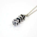Silver necklace with delicate chain, metal pendant