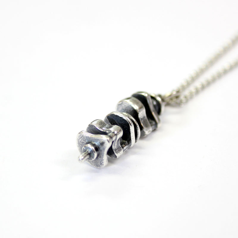 Silver necklace with delicate chain, metal pendant
