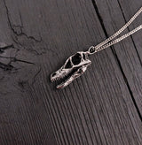 Close-up necklace with detailed skull pendant | Moon Raven