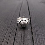Cast it in solid sterling silver that has been hand oxidized it to a stunning finish. As you can see by the reflection in the convex surface, the eye sees all and is guaranteed to repel all evil directed towards its wearer.