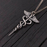 This beautifully detailed caduceus is cast in sterling silver, oxidized in recesses to enhance the fines detail of this 1.5&quot; long pendant.