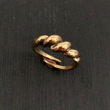 Viking ring is a recreation of one found during field work in 1901 in Bornholm, Denmark. The original ring is massive and weighs 17 grams, this one is scaled down to a much more manageable 7.5 grams. Formed in rolled and twisted solid bronze.