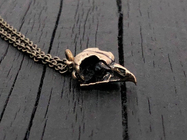 This little Great Horned owl skull, a mere 11/16&quot; long is cast in solid bronze. It is a perfectly proportional 3D miniature of a real great horned owl skull and retains all the unique details of the life size skull.